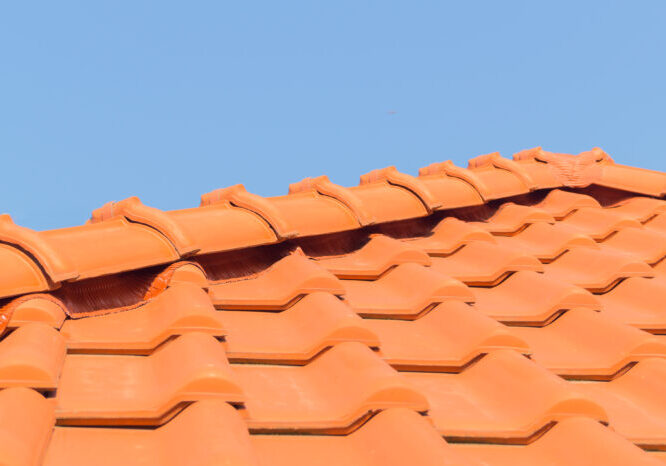 Red tile roof and clean blue sky